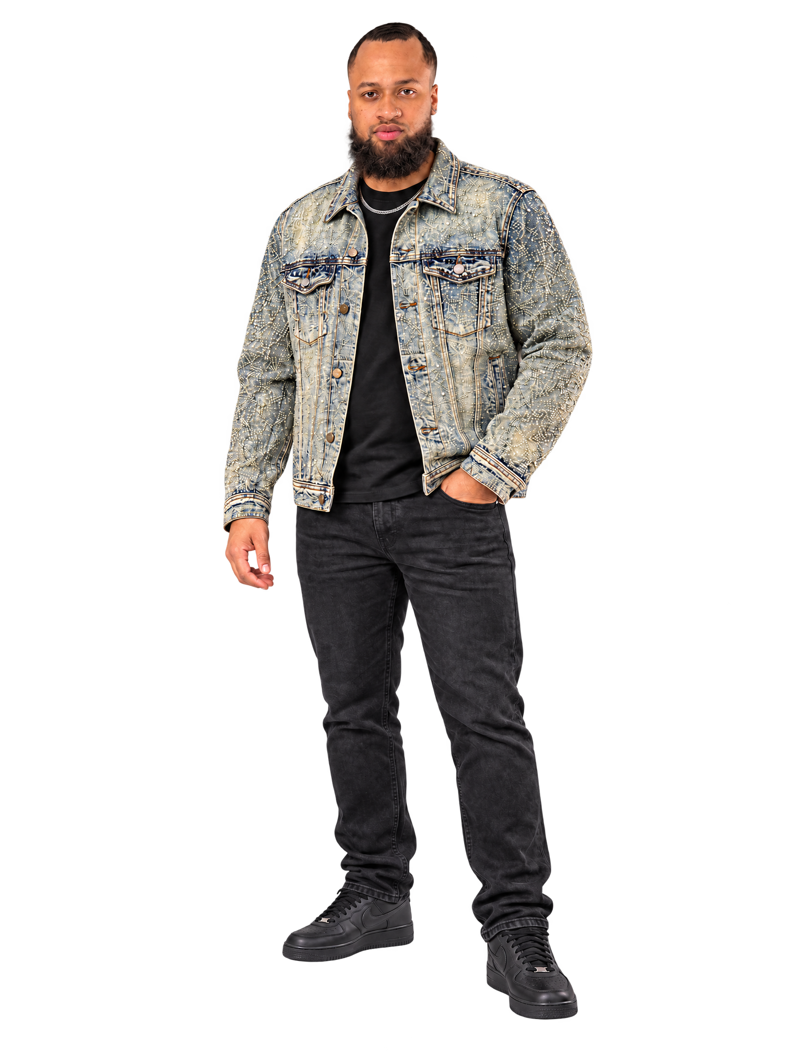 The original full-body model in an embellished gray denim jacket, black T-shirt, black jeans, silver chain, and black sneakers, retaining his supplied pose and appearance.